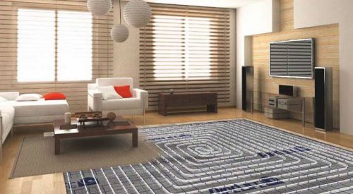 Underfloor heating in a nicely furnished lounge with wooden floors in a Polish Home