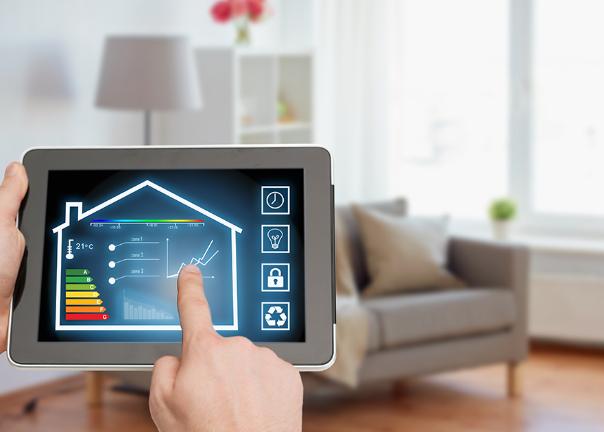 person pointing at a tablet showing a display of a house template